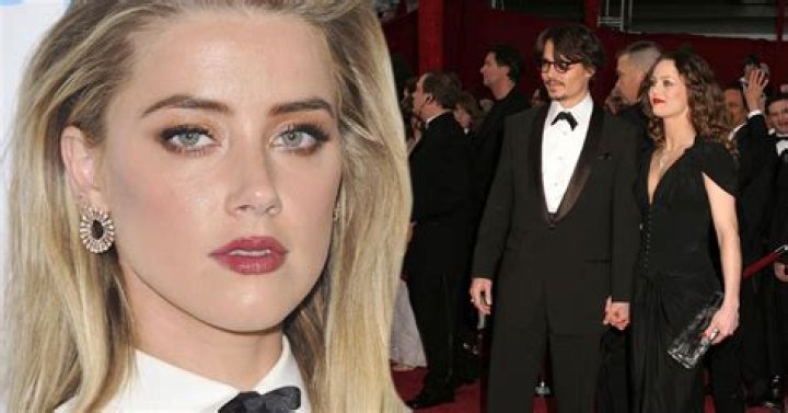 
Amber Heard’s Second Day On Stand Sees Her Talk About His Father David Heard’s Drug Problem & Huge Engagement Ring From Johnny Depp 