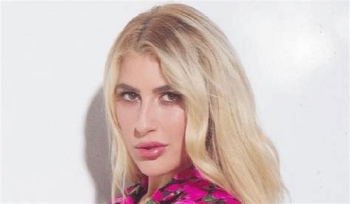 Emma Slater in Bathing Suit is "Avec ma Famille" in France — Celebwell