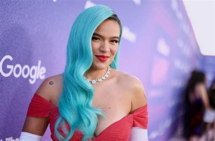 Karol G in Bathing Suit Says "I'm Free" — Celebwell